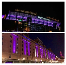 M&T Bank Stadium and the Warehouse at Camden Yards illuminated purple for the Ravens primetime Sunday night home game. 