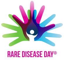 Logo for Rare Disease Day, featuring overlapping colorful hands in blue, pink, and green behind a central droplet design. The words "Rare Disease Day" are written below in bold pink letters.